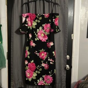 Off the shoulder flower dress. Never worn and still tags on it.